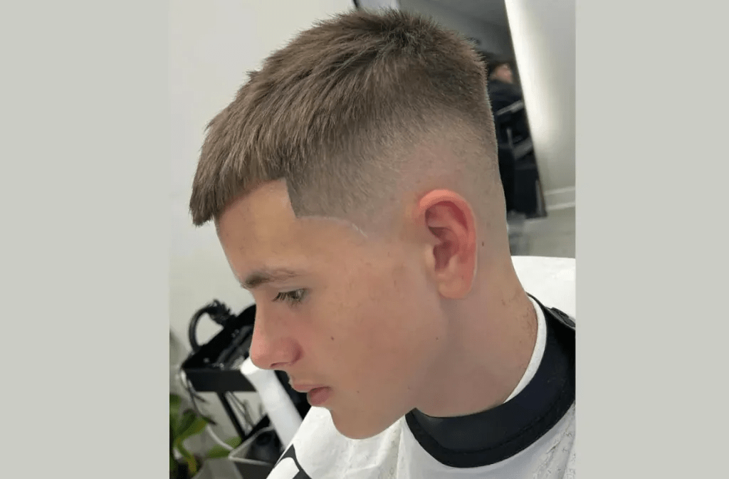 a Short Mid Fade Haircut